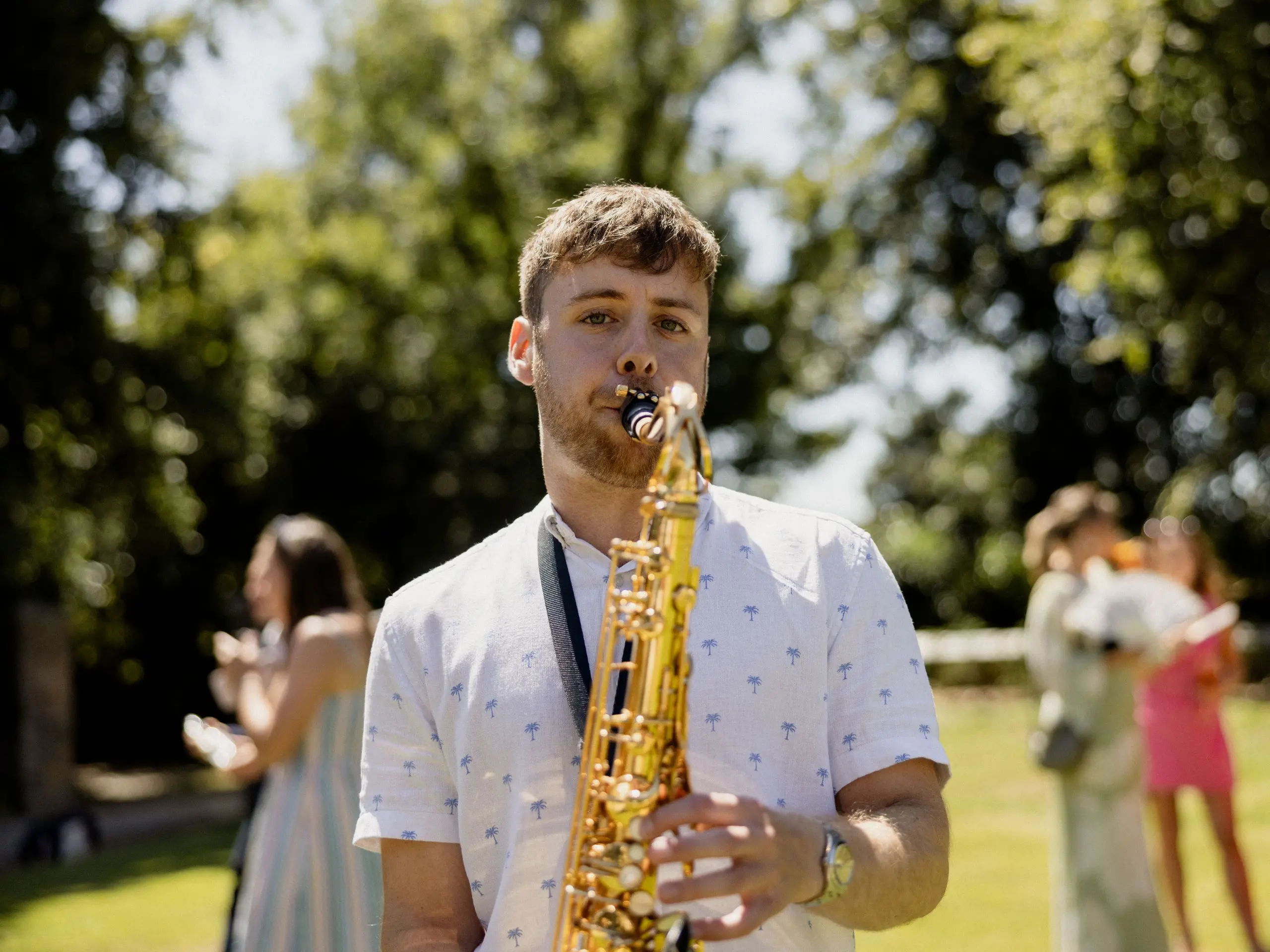Joel Solomons playing saxophone