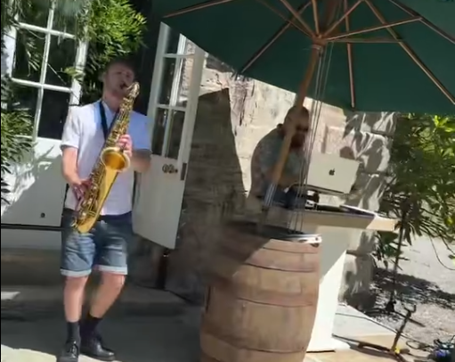 Sax and DJ at Boconnion